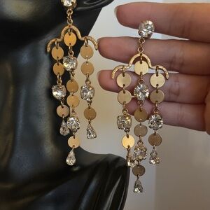 Gold tone cz chandelier earrings. Cubic zirconia long statement earrings